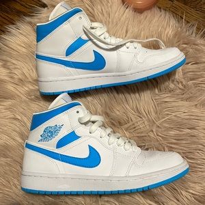 white and blue nike air jordan’s